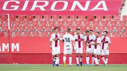 Los jugadores del Huesca celebran uno de los goles anotados este sábado en Montilivi.