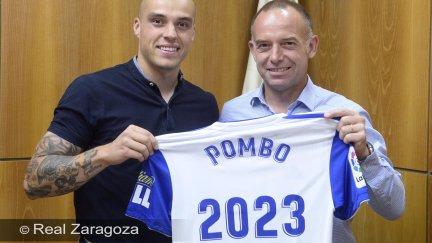 Pombo y Lapetra en la firma del acuerdo.