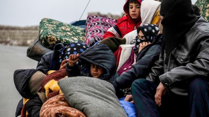 Imagen de una familia de refugiados (EP).