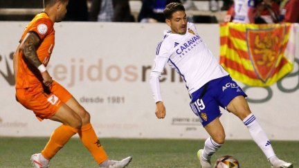 Una imagen del encuentro disputado este martes en el estadio de El Clariano.