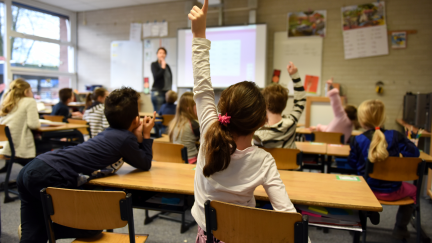 Alumnos en un aula de primaria. / Canva