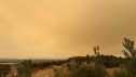 Vista de la humareda del incendio en la localidad de Sotillo de la Adrada (Ávila), donde han sido desalojadas 5.000 personas.