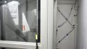 Puerta precintada por la policía en la calle Perines en Santander, donde ha sido asesinada una joven de 27 años.