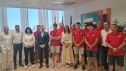 Los tres representantes aragoneses que viajarán a Shanghái, con sus tutores, sus preparadores y la consejera Susín y el director general, Luis Mallada