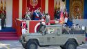 La princesa Leonor, el rey Felipe VI, y la reina Letizia, durante el tradicional desfile militar de la Fiesta Nacional.