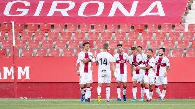 Los jugadores del Huesca celebran uno de los goles anotados este sábado en Montilivi.