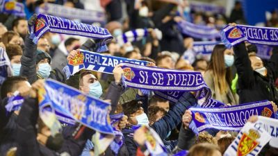 Aficionados del Real Zaragoza, en La Romareda durante el encuentro ante el Eibar. / REAL ZARAGOZA