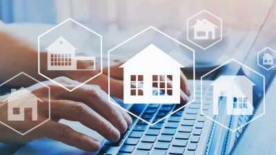 La 'tokenización' de propiedades permite acceder al mercado inmobiliario con una menor inversión económica. / Canva