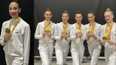 Alba Bautista e Inés Bergua, en el centro junto al resto del equipo nacional, con las medallas conquistadas en la Copa del Mundo