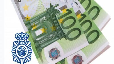 Tres detenidos por intentar pagar con billetes falsos de 100 euros./ Policía Nacional